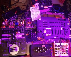 Setup for vjing / live visuals. Two video mixers, a video synthesizer and other effects